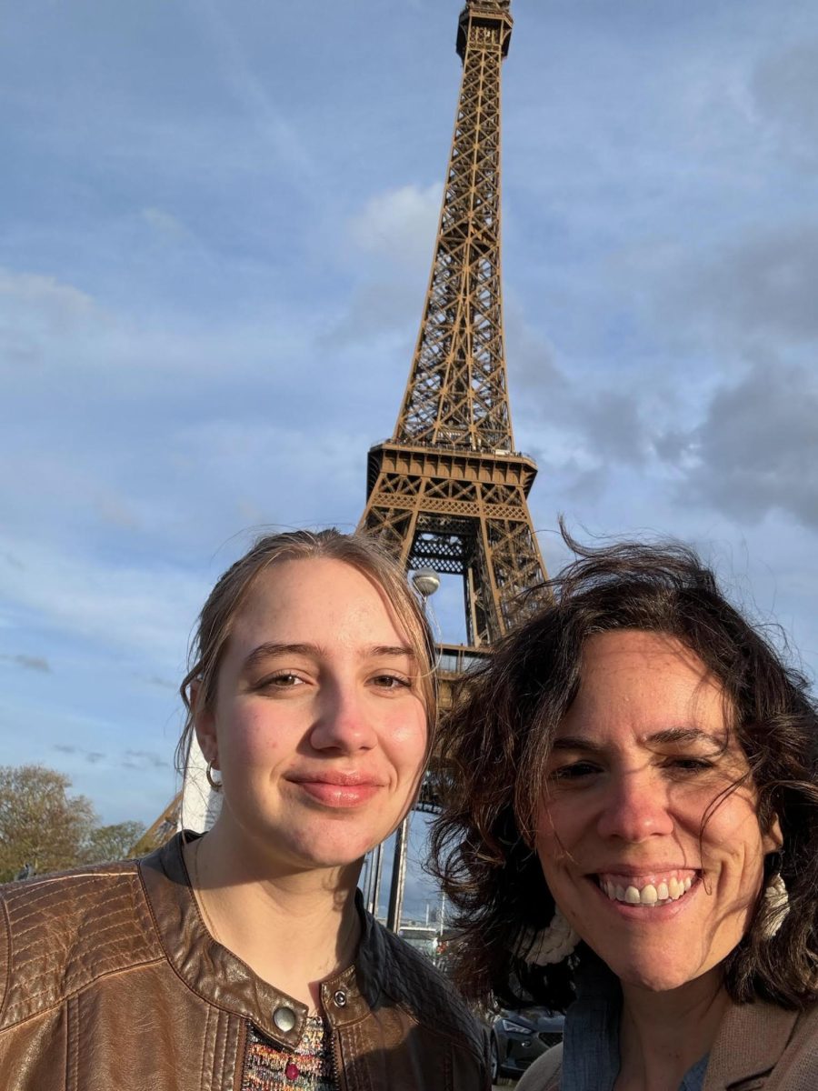 My mom and I in front of the Eiffel Tower over spring break where I tried out a "capsule closet" and mixed and matched every day.
